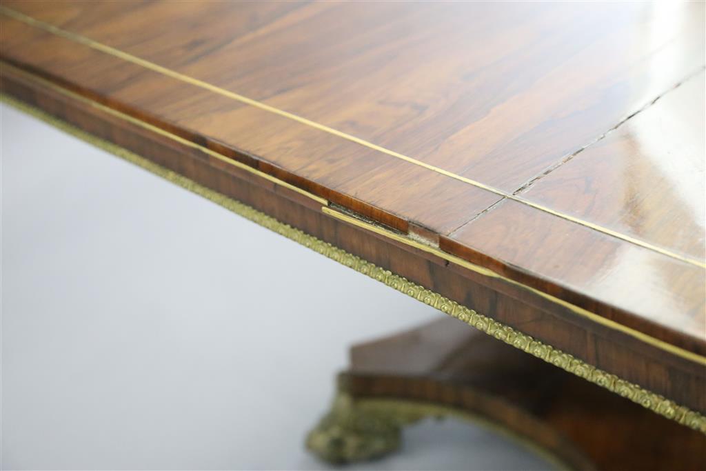 A Regency brass mounted rosewood breakfast table, W.4ft 6in. D.3ft 6in. H.2ft 6in.